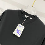 Black crew-neck T-shirt with Burberry neck label and hanging tag