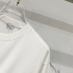 White Burberry T-shirt side view with clean sleeve and hem