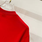 Red Burberry T-shirt shoulder and crew neckline view