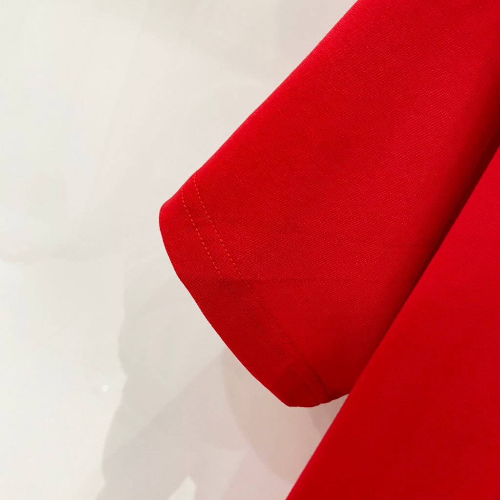 Red Burberry T-shirt short sleeve hem close-up