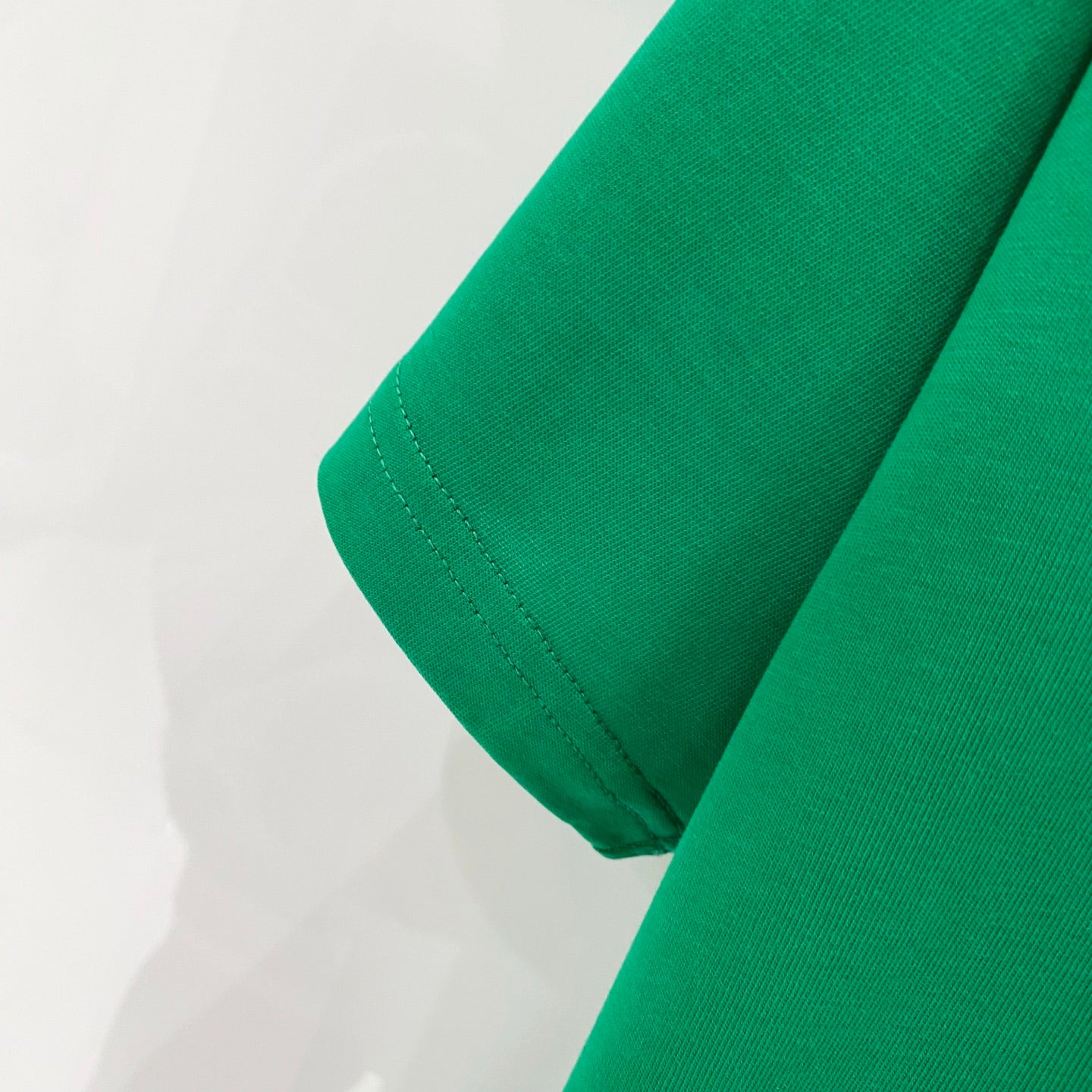 Green T-shirt short sleeve with stitched hem detail