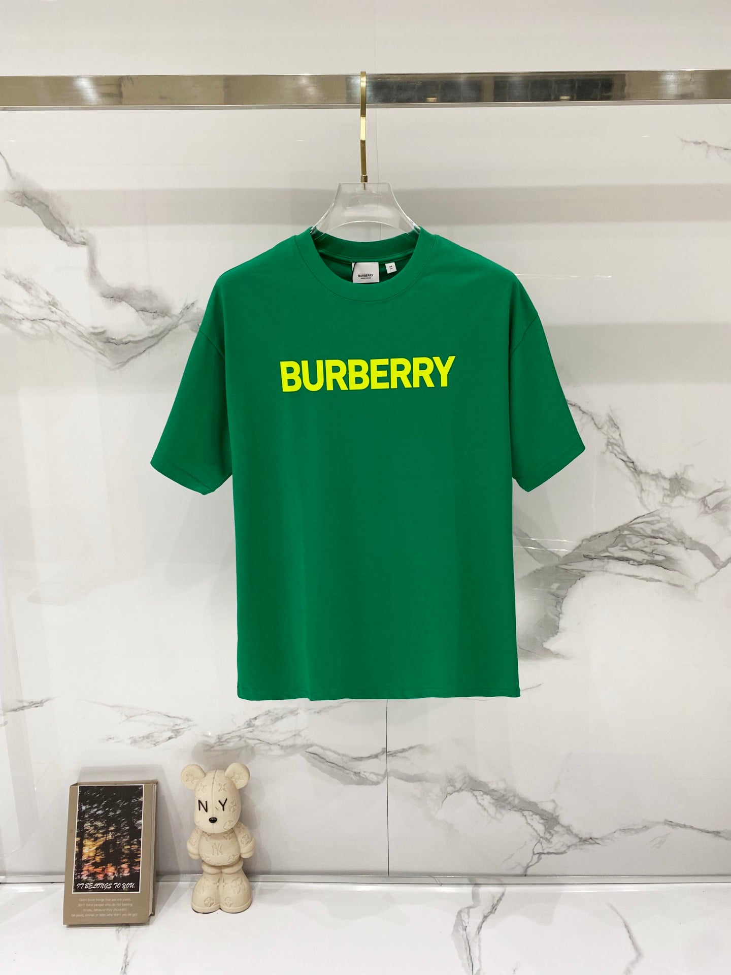 Green T-shirt with yellow 'BURBERRY' chest logo, short sleeves