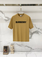 Burberry logo T-shirt in tan with bold black "BURBERRY" print on the chest
