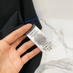 Burberry black T-shirt care label near collar