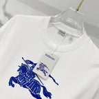 White T-shirt with blue horse rider graphic print and attached brand tags.