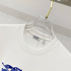 White crew-neck T-shirt with collar seam and brand label inside neckline.
