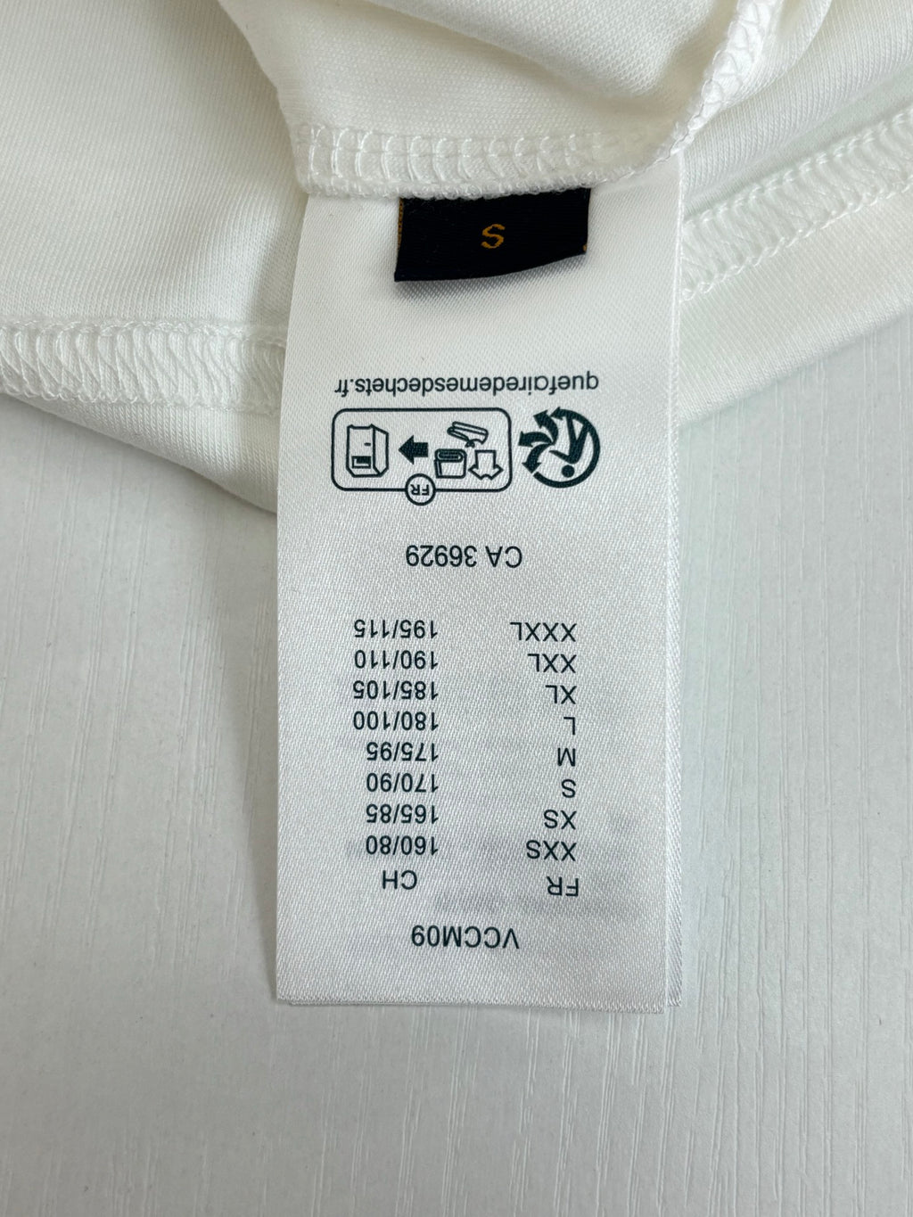 Louis Vuitton T-shirt care label at inside neck, size and instructions