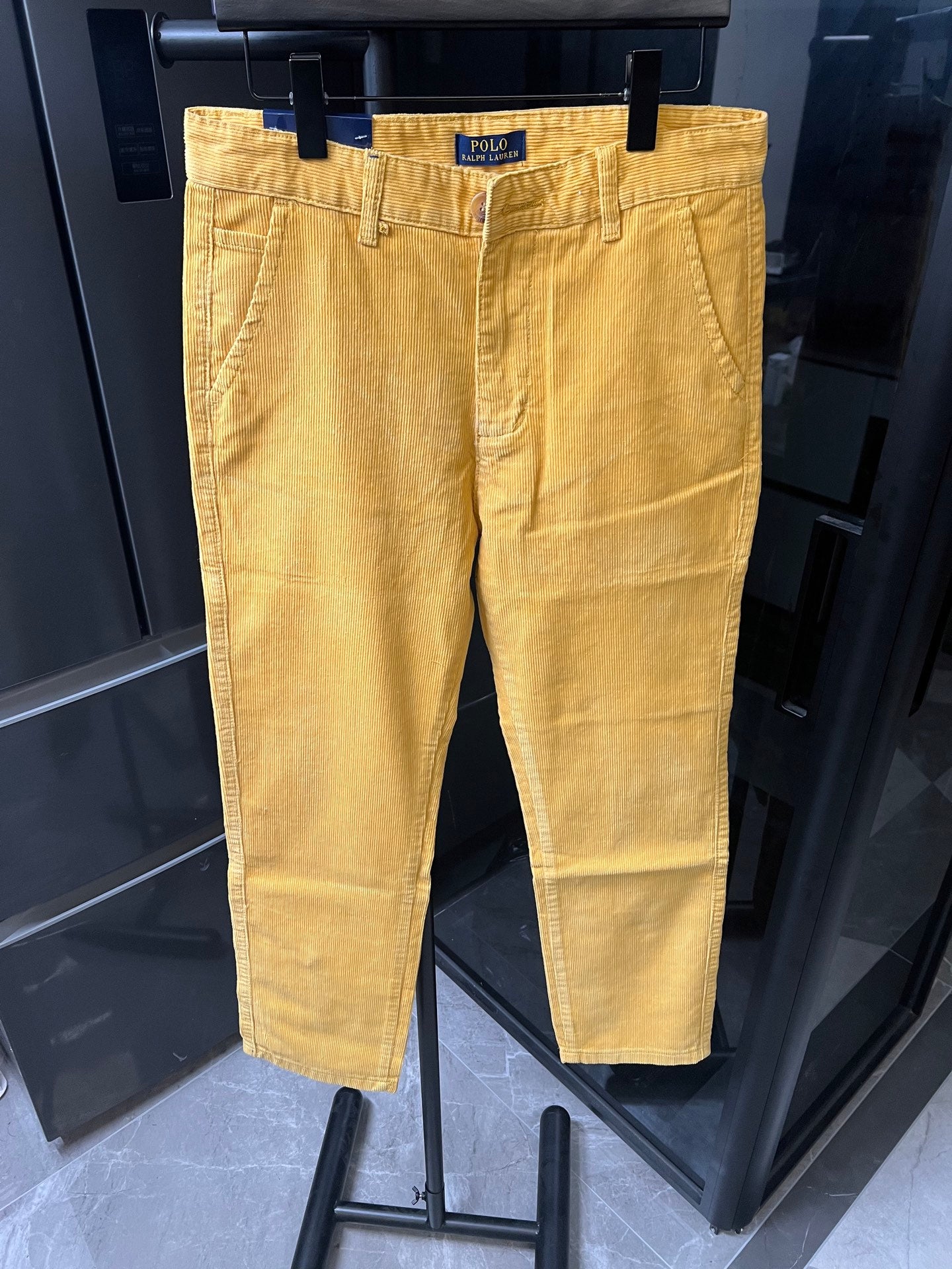 Ralph Lauren mustard-yellow pants with pleats, front button, and belt loops