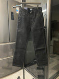 Dark gray corduroy jeans with zip fly and belt loops