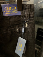 Corduroy jeans with POLO Ralph Lauren label and hanging price tag