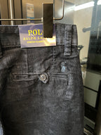 Denim jeans waistband with button fly and round back-pocket button; POLO tag