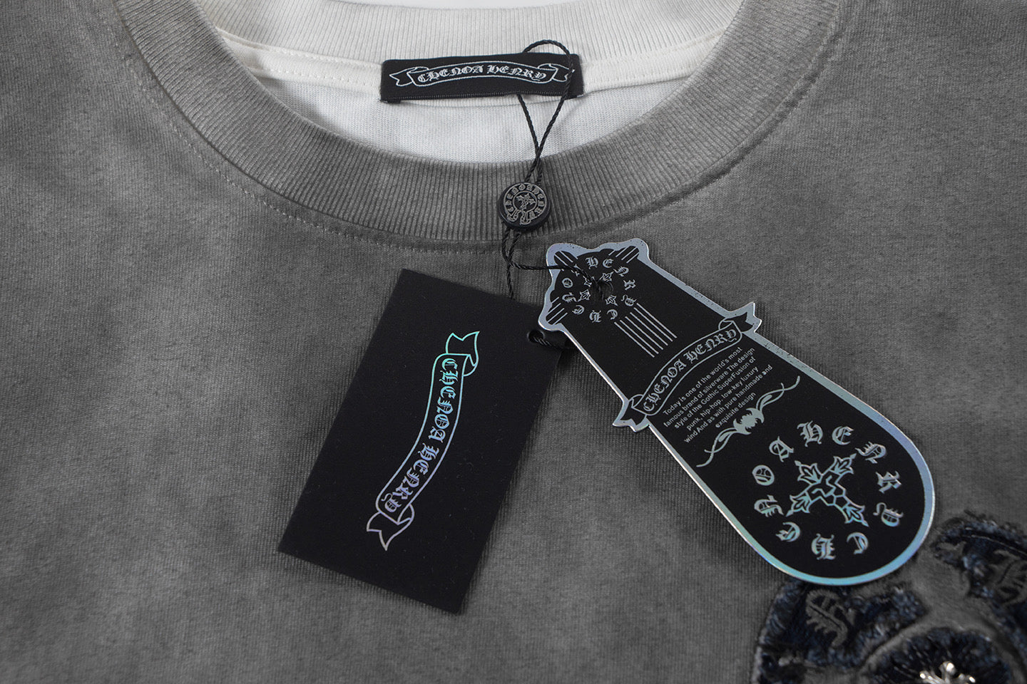 Crewneck T-shirt with hanging tags and navy embroidered chest detail