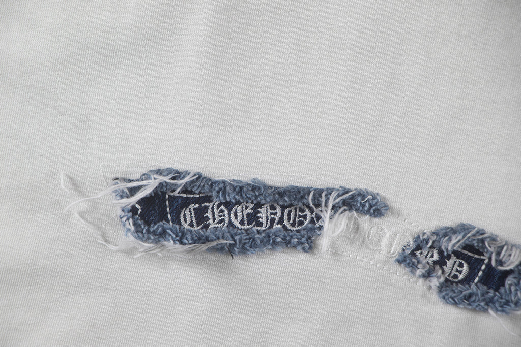 Hem embroidery and stitched trim on T-shirt fabric