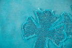 Turquoise T-shirt with textured glitter floral applique detail