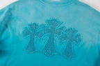 Turquoise T-shirt with large glittery floral chest embroidery