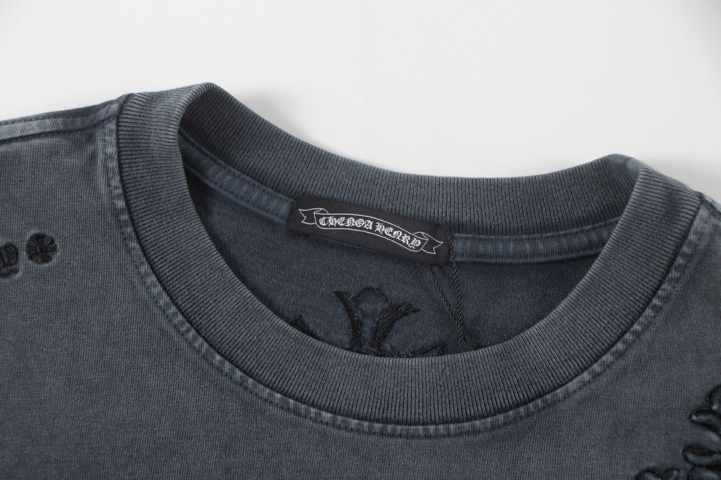 Dark gray graphic T-shirt crew neck with inner label and stitched trim