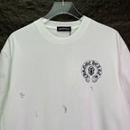White short-sleeve graphic T-shirt with small circular chest logo