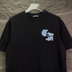 Black short-sleeve T-shirt with small light-blue logo graphic