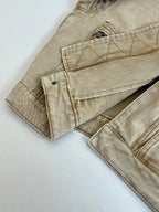 Beige jacket sleeve and hem with two patch pockets