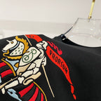 Black T-shirt close-up of colorful horse rider graphic and red text