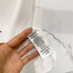 Burberry white T-shirt inside care label on hem