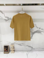 Tan short-sleeve T-shirt, back view, ribbed crew neck