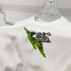 Burberry white T-shirt with green and black graphic print at chest