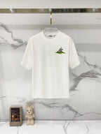 Burberry crew-neck T-shirt in white with small green bird graphic on chest