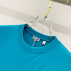 Turquoise crewneck T-shirt with Burberry size label at the collar