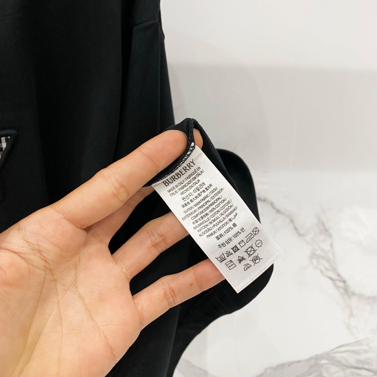 Black Burberry T-shirt care label tag