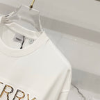 White T-shirt on hanger with crew neck and partial 'BURBERRY' logo