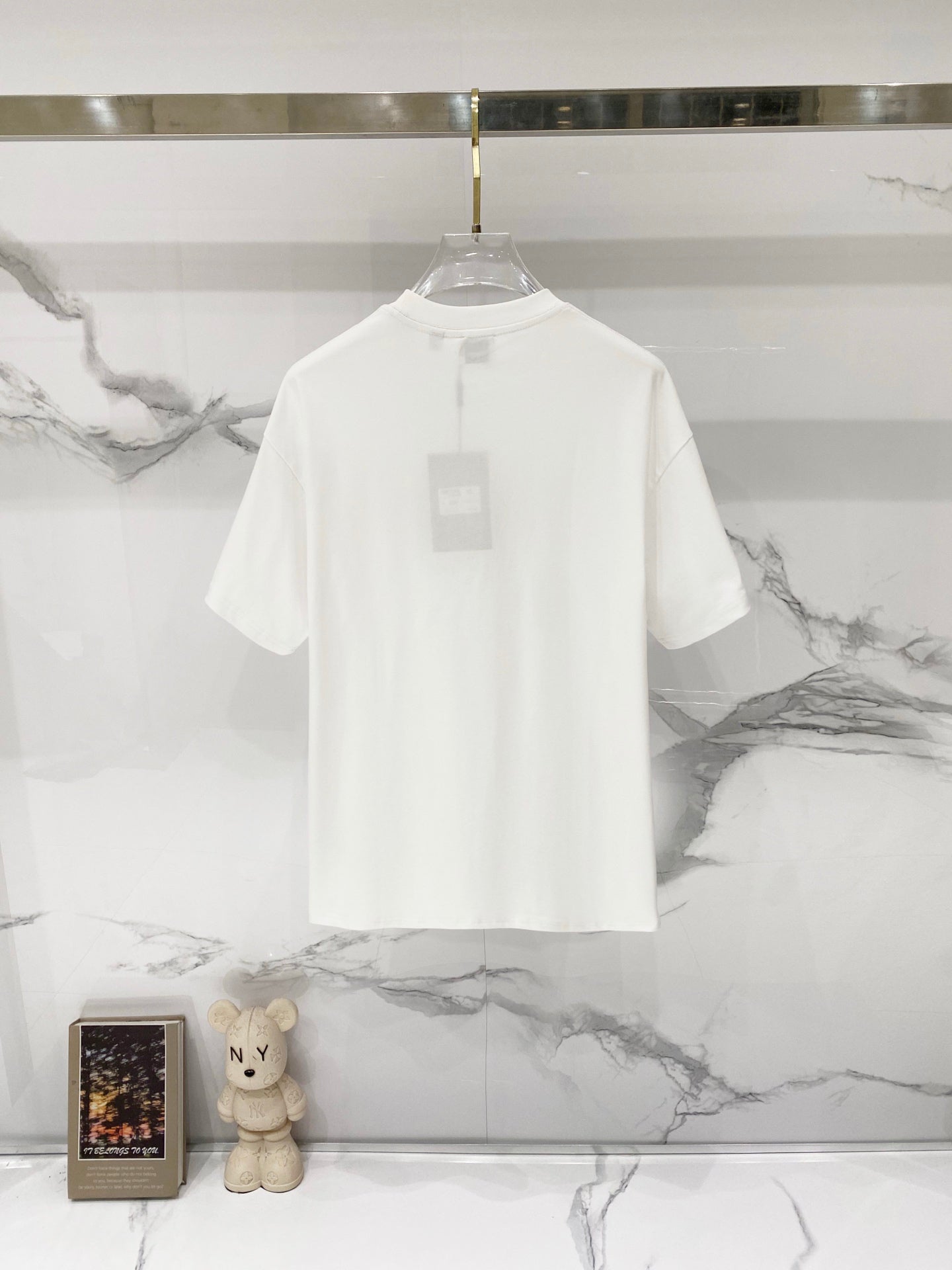 White Burberry T-shirt on hanger, crew neck and back view label tag