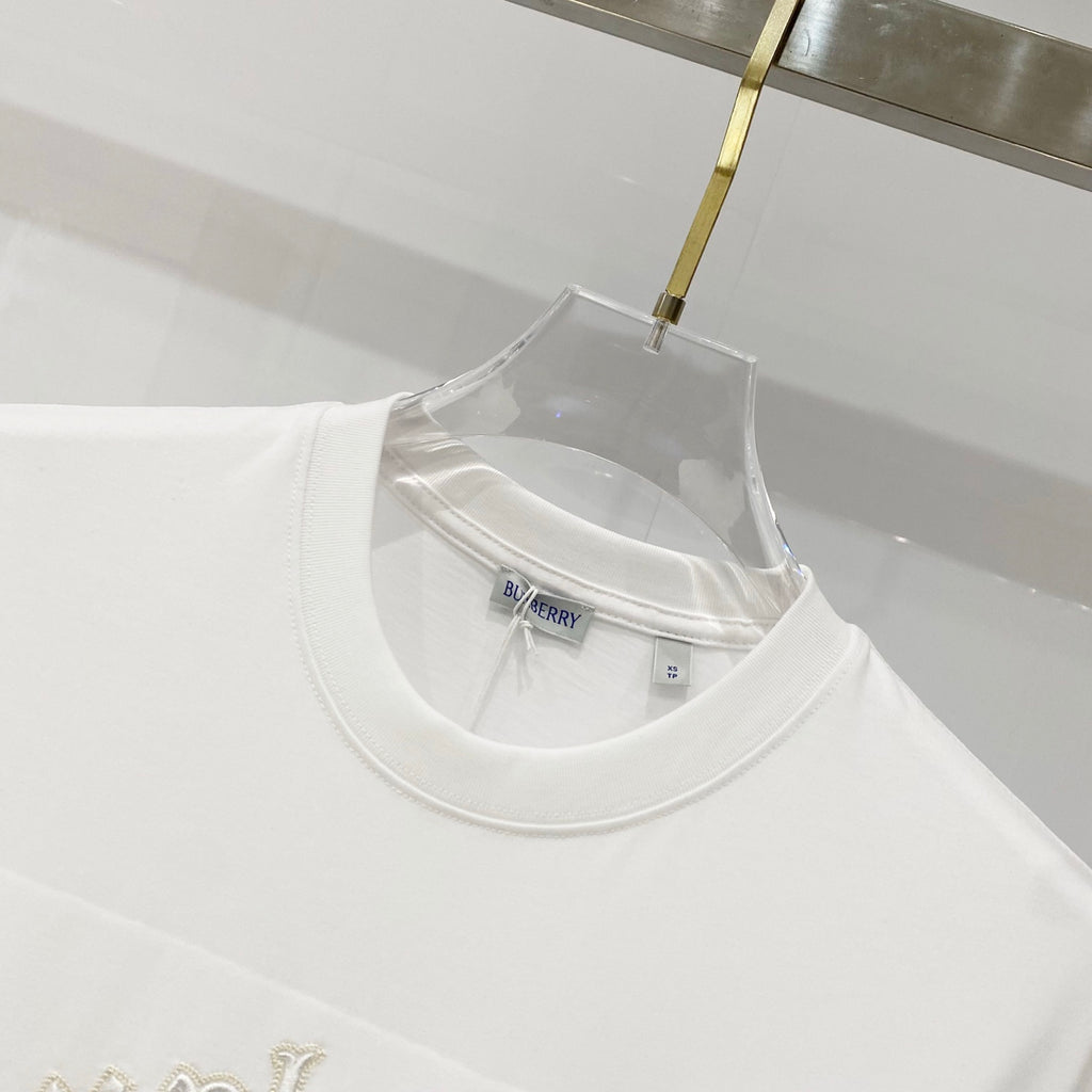 White crew-neck T-shirt with Burberry label at the neckline