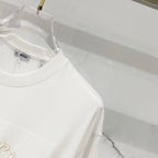 White short-sleeve T-shirt side view with clean hem and crew neckline