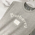 Grey short-sleeve T-shirt with large embroidered-style “Burberry” lettering