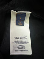 Louis Vuitton care label tag with cleaning instructions and model number