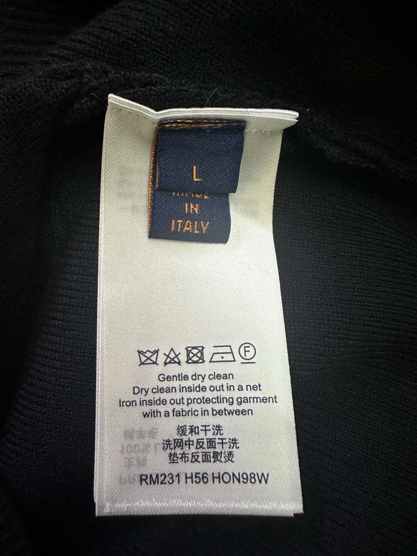 Louis Vuitton care label tag with cleaning instructions and model number
