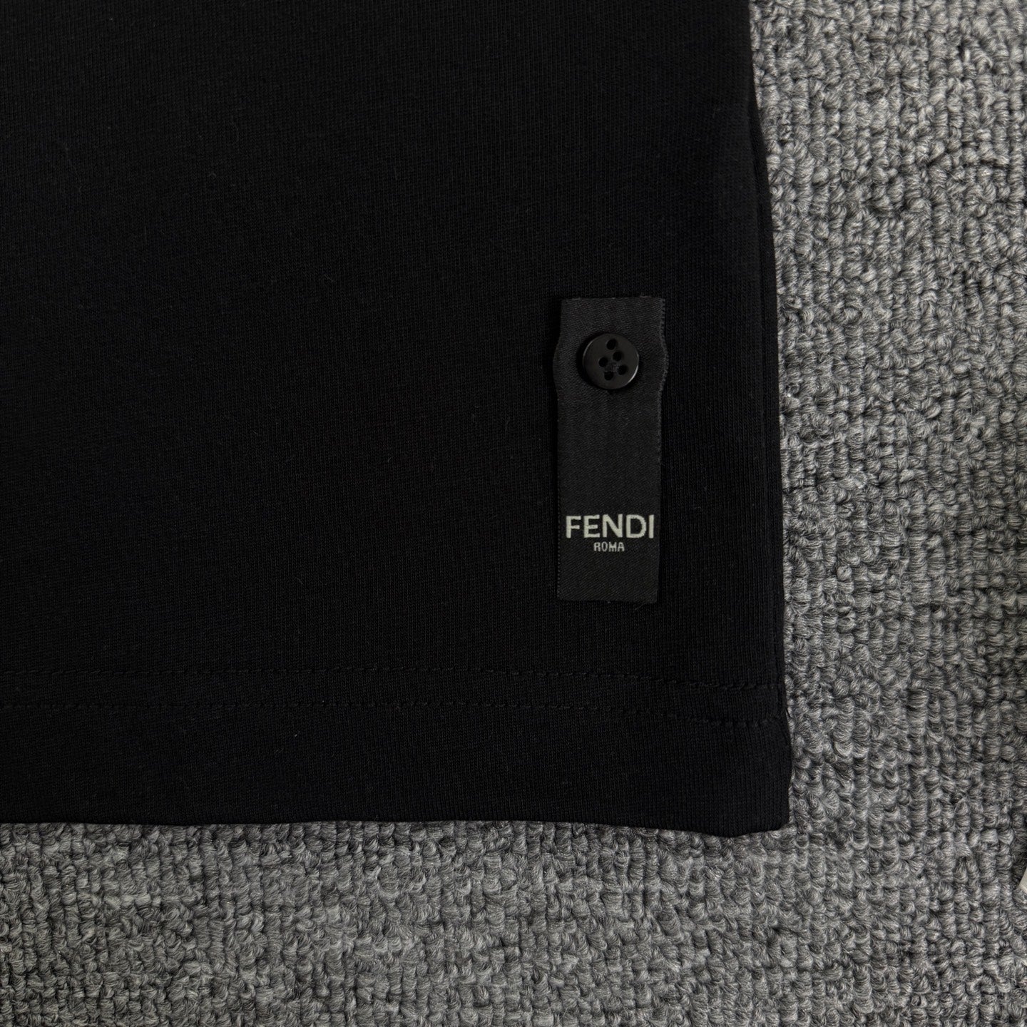 Fendi black short-sleeve T-shirt with small side tag near hem