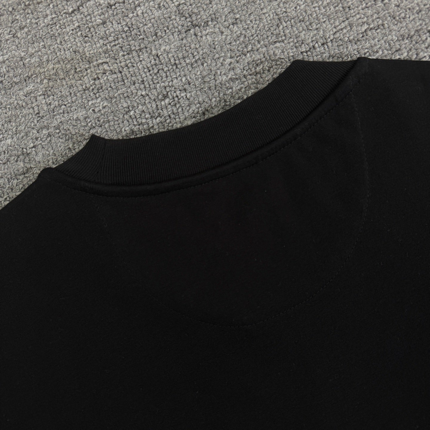 Fendi black crew-neck T-shirt neck and shoulder seam close-up