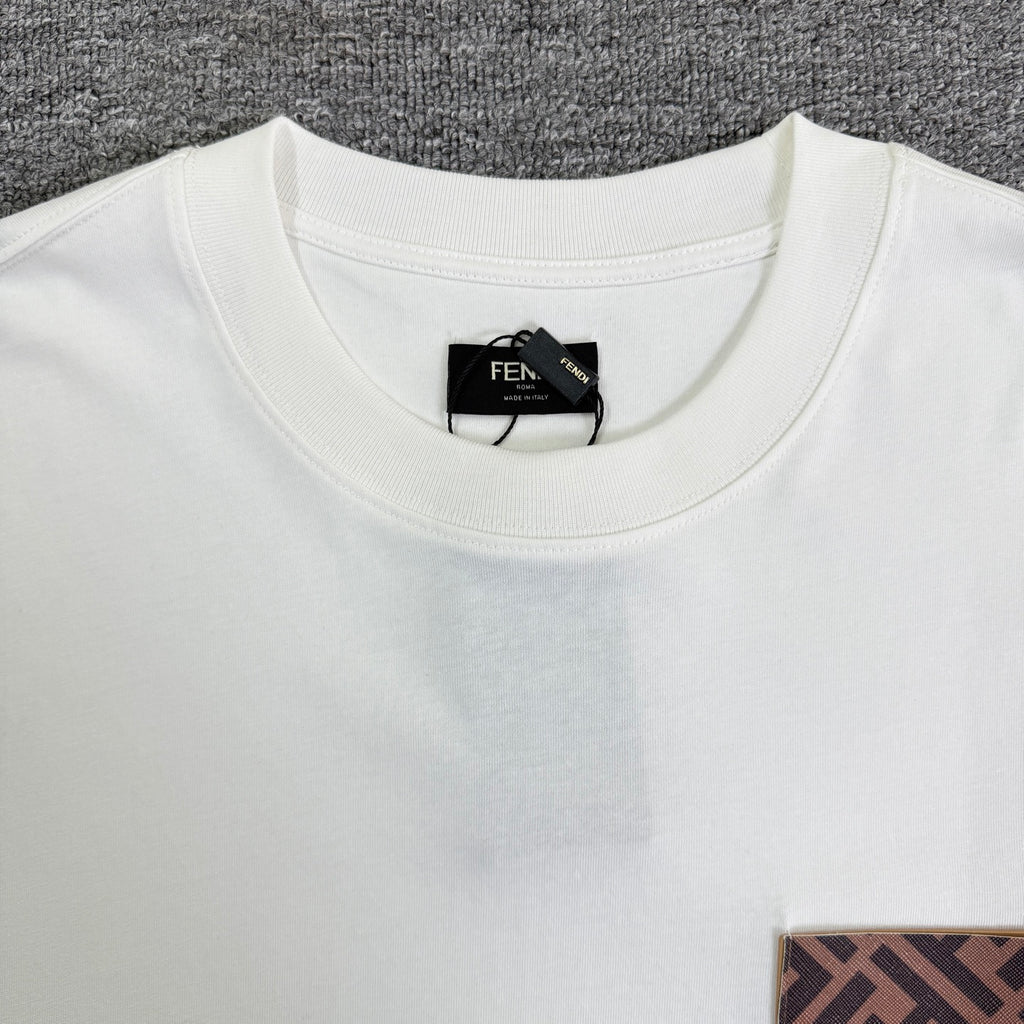 White Fendi T-shirt closeup: ribbed crew neck and black neck label.