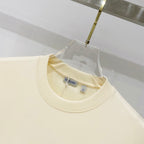 Pale yellow short-sleeve T-shirt neckline with inner Burberry label