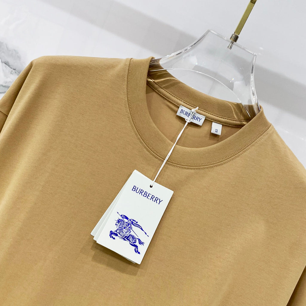 Tan crew-neck short-sleeve T-shirt with logo hang tags