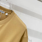 Tan short-sleeve T-shirt front side panel detail