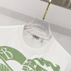 Kids white T-shirt neckline with green graphic print and Burberry neck label
