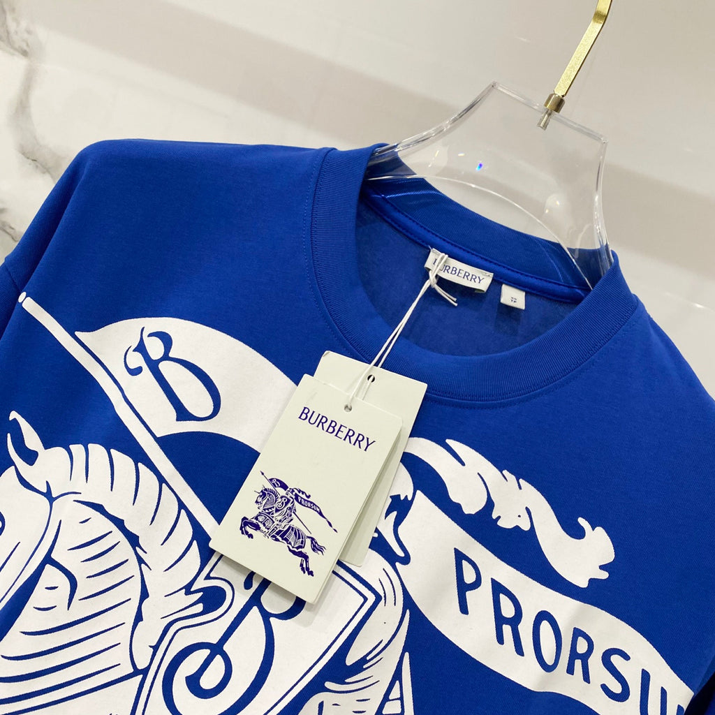 Blue crew-neck T-shirt with hanging tag and white graphic text PRORSUM