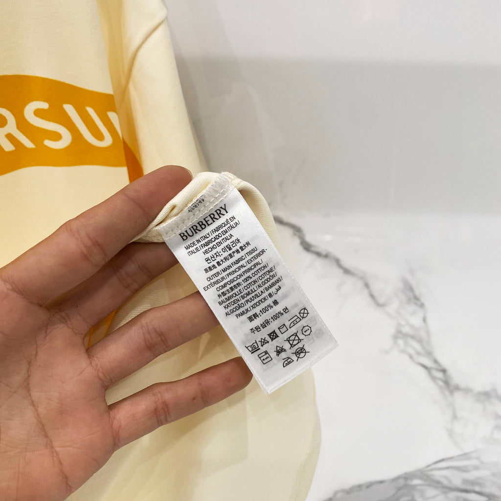 Burberry short-sleeve T-shirt care label on cream fabric