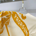 Burberry short-sleeve T-shirt, cream with diagonal orange “PRORSUM” print