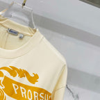 Burberry short-sleeve T-shirt collar close-up with cream fabric and logo tag