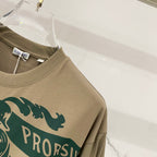 Burberry beige T-shirt shoulder and sleeve with green 'PRO...' graphic
