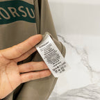 Burberry beige T-shirt care and size label on inner seam